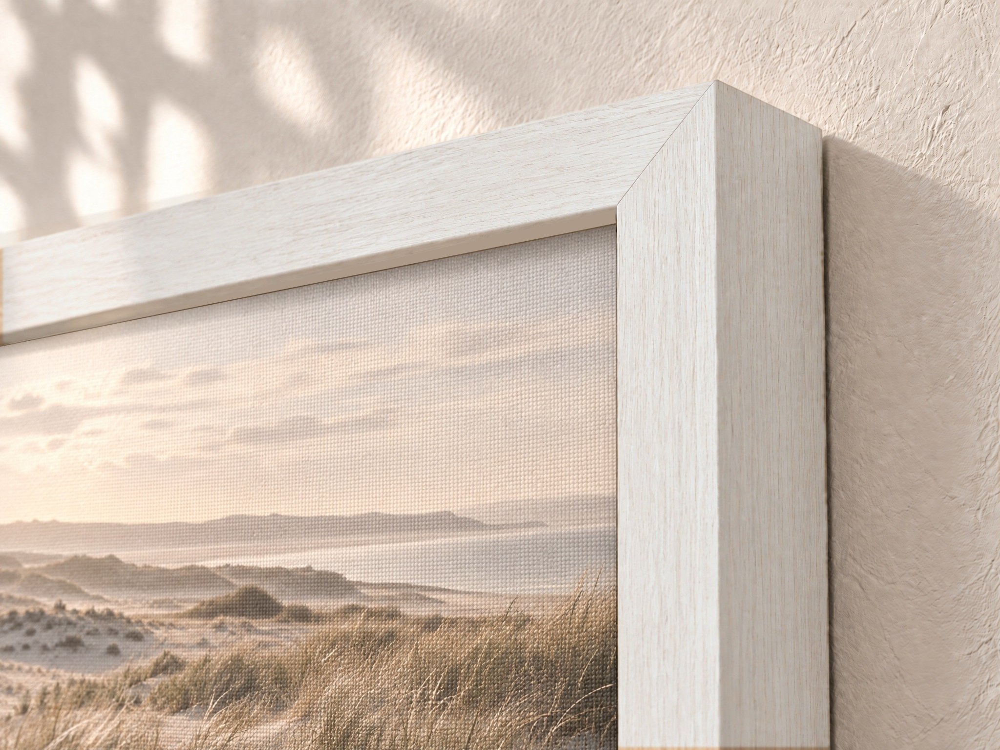 Framed Canvas Print — White: Angled corner close-up of the White wood veneer frame showing grain and profile